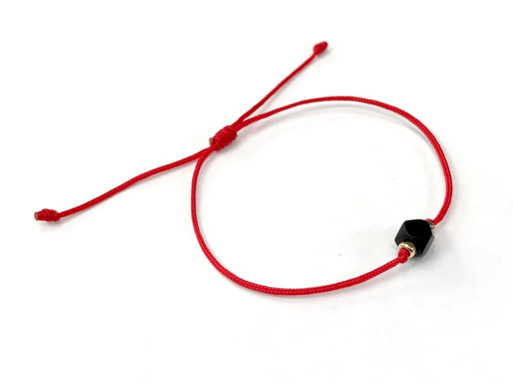 <b>Natural Azabache (Jet Stone) With 14K Gold Yellow Spacers On Kabbalah Red/b><br><i>Red Cord</i>