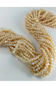 <b>Pearl Lt Orange 4.5mm x 5mm</b><br><i> One 16" strand</i>